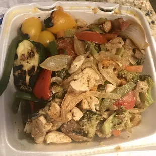 a meal in a styrofoam container