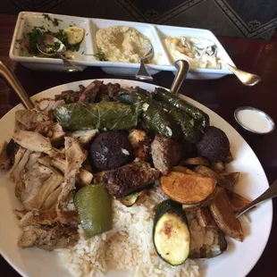Sampler, burned falafel ,meat &amp; chicken was bad &amp; burned ,the grape leaves were big but good, the rice &amp; potato were really good