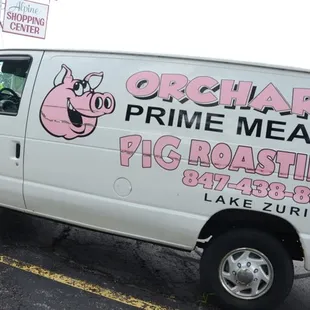 a white van parked in a parking lot