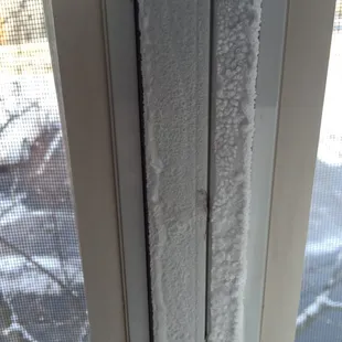 Inside of the windows with our heat blasting. I'd gander to say these may be inefficient.