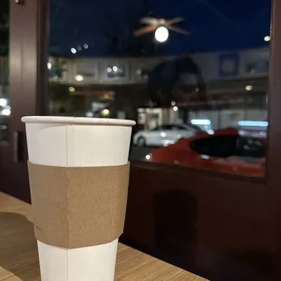 a cup of coffee on a table