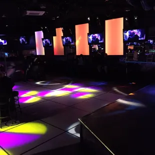a large room with a lot of lights on the floor