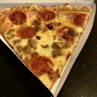 Meat Lover's Slice for $7. Extremely overpriced but the cheapest "meal" in the casino...