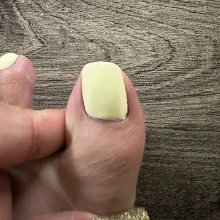 Cuticles are cut and nails rounded