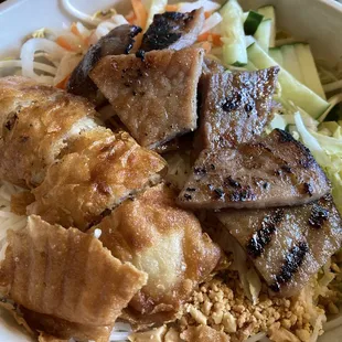 Bun Thit Nuong Cha Gio (rice stick noodle salad with egg roll, grilled pork, daikon &amp; carrots, cilantro, bean sprouts, and cucumbers.)