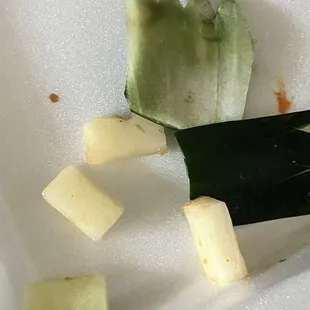 Pieces of jicama in my regular tuna roll...soooo gross!. This has NEVER been in any roll I've ordered here.