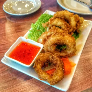 Enormous and crisply fresh fried calamari rings... like enormous onion rings, with side of sweet and sour sauce.