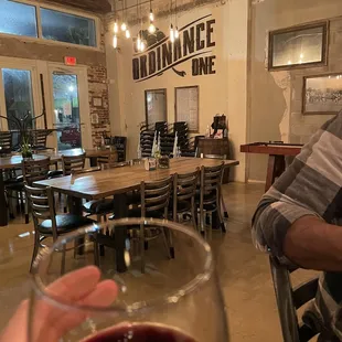 a man holding a glass of wine