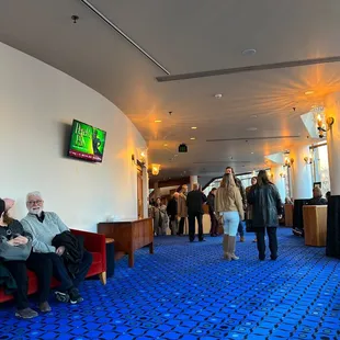 people walking and sitting