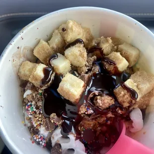 a bowl of ice cream with toppings