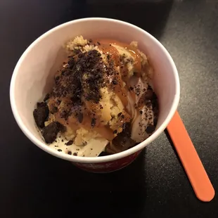 Chocolate chip cookie FroDo with cookies and cream froyo, vanilla froyo, topped with caramel sauce and crushed Oreos...YUM!