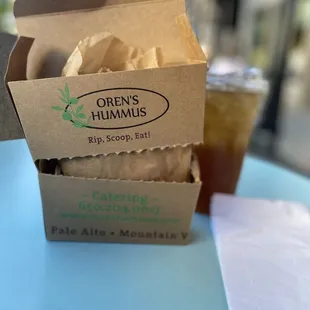 To go box for falafel pita.