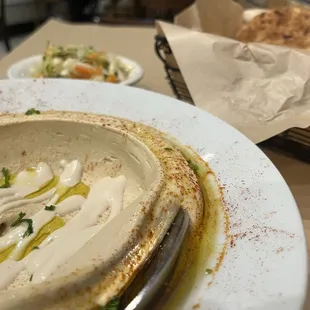 Hummus, pita, pickled cabbage.