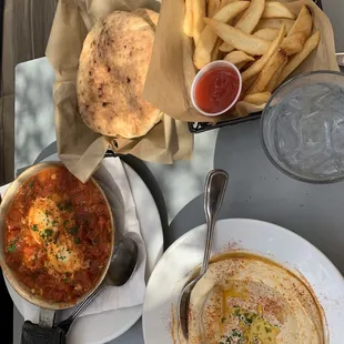 Shakshuka, Hummus, French Fries with Ketchup, Pita