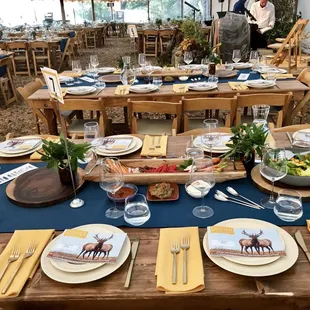 Fundraiser for 350 in a tent in a field. Beautiful family style service.