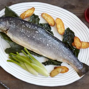 Poached char with baby felnnel and new potatoes