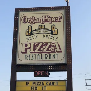 a sign for a pizza restaurant