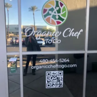 Store front with QR code and brochure holder