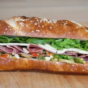 a sandwich with meat and vegetables