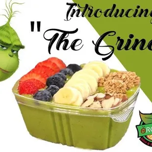 a bowl of fruit with the grin