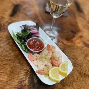 a plate of shrimp and vegetables