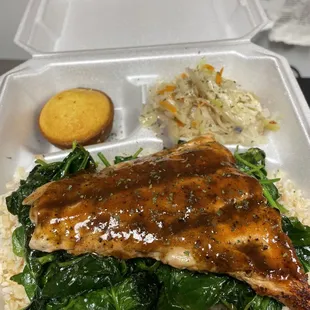 Jerk Salmon over sautéed spinach &amp; brown rice, cabbage &amp; corn muffin.