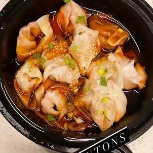 two bowls of food on a table