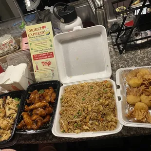 when I got here is cream Crab Puffs Orange Chicken chicken, Fried Rice shrimp, and chicken