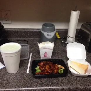 General Tso chicken and steamed rice with cheesecake and a large lemonade