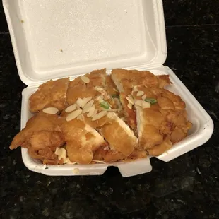 Almond Boneless Chicken (ABC). The 2 staples to hold the box shut were sweating it!