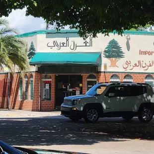 car parked in front of building