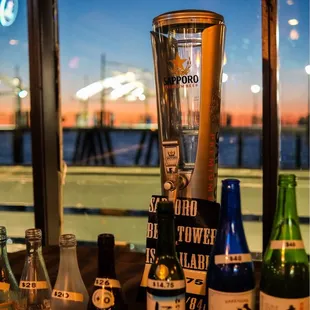 a blender and bottles of sake