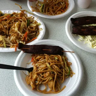 Chicken lo-mein and beef skewers.