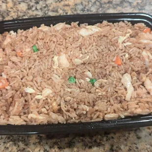 The free Chicken Fried Rice you get when you order a certain amount of food. A bit bland but that's better than salty.