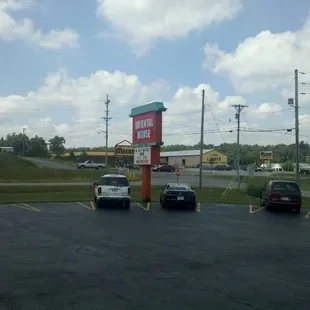 a parking lot with cars parked in it