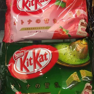 two packets of kitkat on display