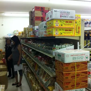 people shopping in a grocery store