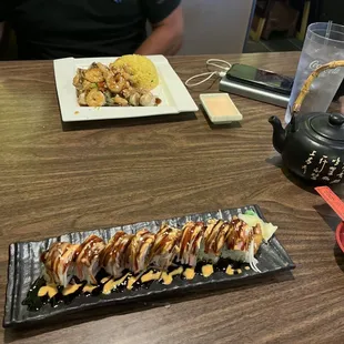a plate of sushi and a plate of rice