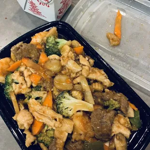 Triple Crown - Shrimp, Chicken, and Beef in a spicy sauce.   Comes with a side of white or fried rice.