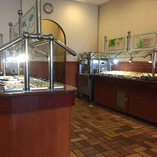 a buffet area with a variety of food items