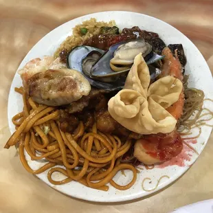 Just a plate of random food items from the buffet