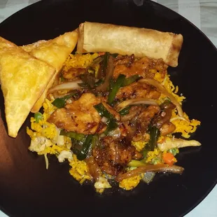 Mongolian Chicken with Chicken Fried Rice Lobster Roll, Flying Dragon roll,  Crab Rangoon and Spring rolls.
