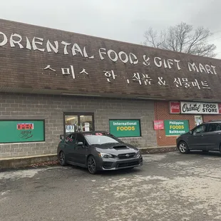 two cars parked outside