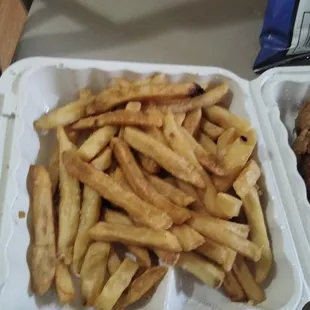 french fries in a styrofoam container