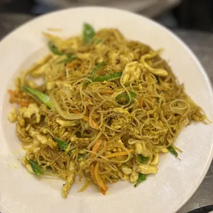 a plate of noodles and vegetables