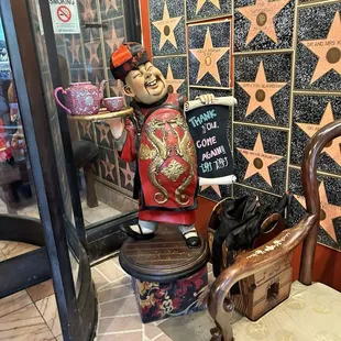 Figurine at the door.