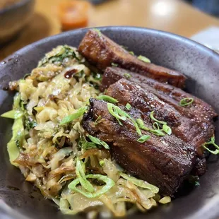 Brown rice, bok choy, green cabbage, and pork belly
