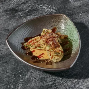 Stuffed Shishito Peppers. Tempera fried spicy tuna shishito peppers w/house spicy aioli &amp; bonito.