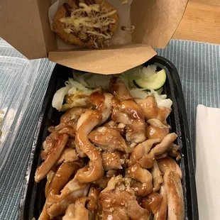 Chicken teriyaki, yaki soba and veggies with potato croquette