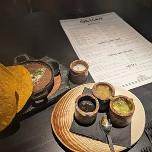 Salsas with refried beans and tortillas
